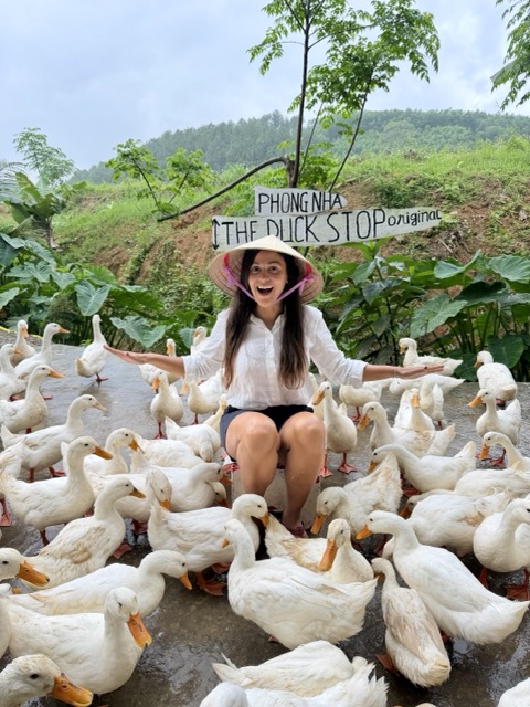 Feeding ducks at Phong Nha Duck Stop Vietnam