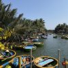 Vietnamese basket boat ride through coconut palm forest in Hoi An