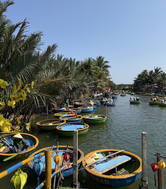 Vietnamese basket boat ride through coconut palm forest in Hoi An