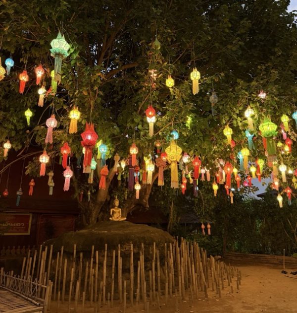 Chiang Mai city in northern Thailand surrounded by mountains, temples, and historic old town streets