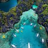 Divers exploring Barracuda Lake in Coron, Philippines with unique thermocline layers.