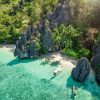Island-hopping adventure in El Nido, Philippines with turquoise waters and limestone cliffs