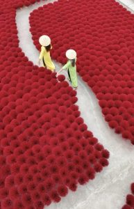 Visit a traditional incense village near Hanoi, Vietnam, where vibrant bundles of incense are handcrafted and laid out to dry in striking patterns. This unique cultural experience offers a glimpse into local craftsmanship and is one of the most photogenic hidden gems in any Vietnam itinerary. Incense village Hanoi Vietnam colorful incense sticks drying