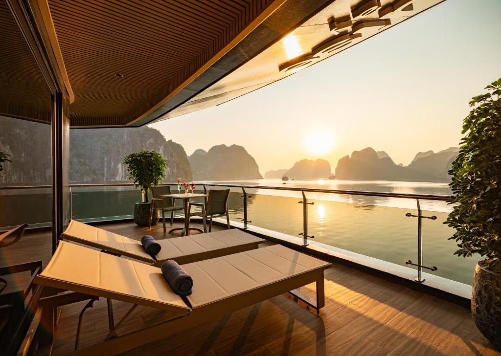 Cruise through the stunning limestone karsts of Halong Bay on a luxury cruise, one of the top experiences in Vietnam. Relax on deck, take in panoramic views, and enjoy the perfect blend of comfort and adventure on this unforgettable journey.