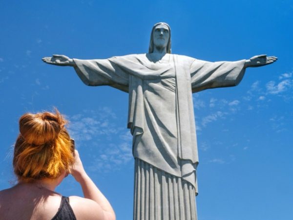 Brazil group trip itinerary featuring Rio de Janeiro, Paraty, beaches, Christ the Redeemer, and optional Ilha Grande extension for solo travelers on a bucket list adventure.