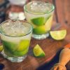 Traditional Brazilian caipirinha cocktail made with lime, sugar, ice, and cachaça served in a glass, part of a Brazil group travel experience in Rio de Janeiro.