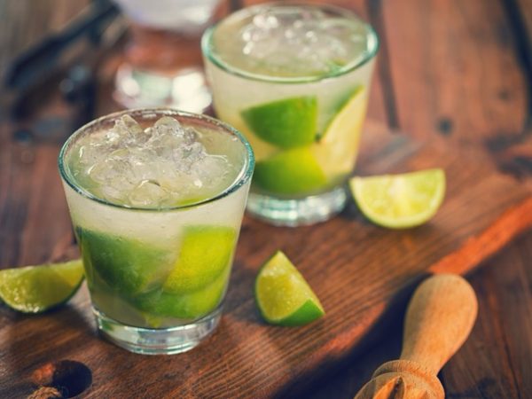 Traditional Brazilian caipirinha cocktail made with lime, sugar, ice, and cachaça served in a glass, part of a Brazil group travel experience in Rio de Janeiro.