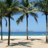 Beaches of Rio de Janeiro, Brazil including Copacabana and Ipanema with golden sand, ocean waves, and city skyline as part of a Brazil group travel itinerary.