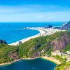 Scenic hiking trails in Rio de Janeiro, Brazil with tropical forest paths and panoramic viewpoints overlooking beaches, mountains, and the city skyline.