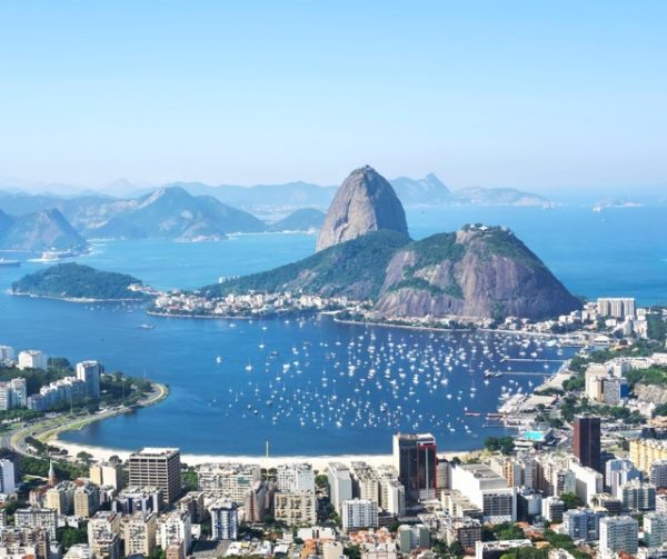 Pão de Açúcar (Sugarloaf Mountain) in Rio de Janeiro, Brazil with panoramic views over Guanabara Bay, beaches, and city skyline as part of a Brazil group travel itinerary.