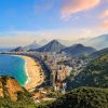 Scenic hike in Rio de Janeiro, Brazil with panoramic viewpoints overlooking beaches, mountains, and city skyline as part of a Brazil group travel itinerary.