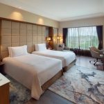 Elegant 5-star hotel suite in Agra offering a stunning view.