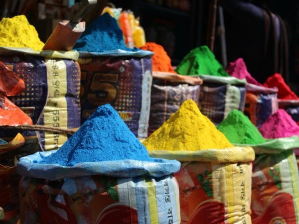 Vibrant colors at a private, high-end Holi festival event during an India group expedition.