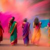 Travelers participating in a safe, premium-managed Holi festival celebration in India.