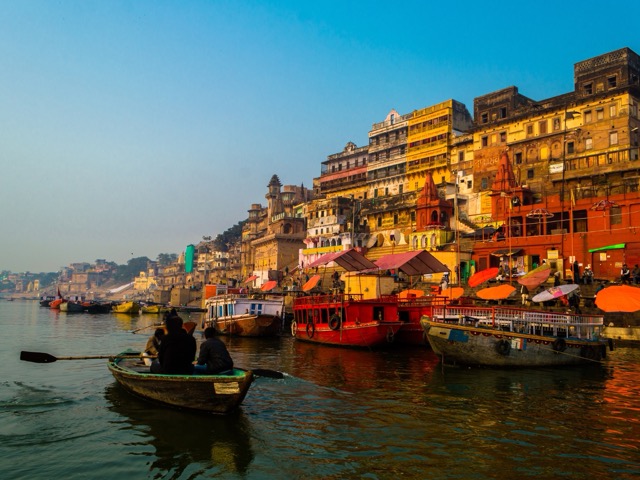 Traditional boats on the Ganges at sunrise