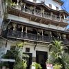 Exterior of the historic Emerson Spice boutique hotel with ornate wooden balconies in Stone Town, Zanzibar.