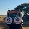A custom Gagago 4x4 safari jeep entering the official Serengeti National Park gate to begin a luxury wildlife tour.