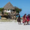 The Rock Restaurant on a coral outcrop in turquoise waters off Michamvi Beach during a Gagago Zanzibar tour.