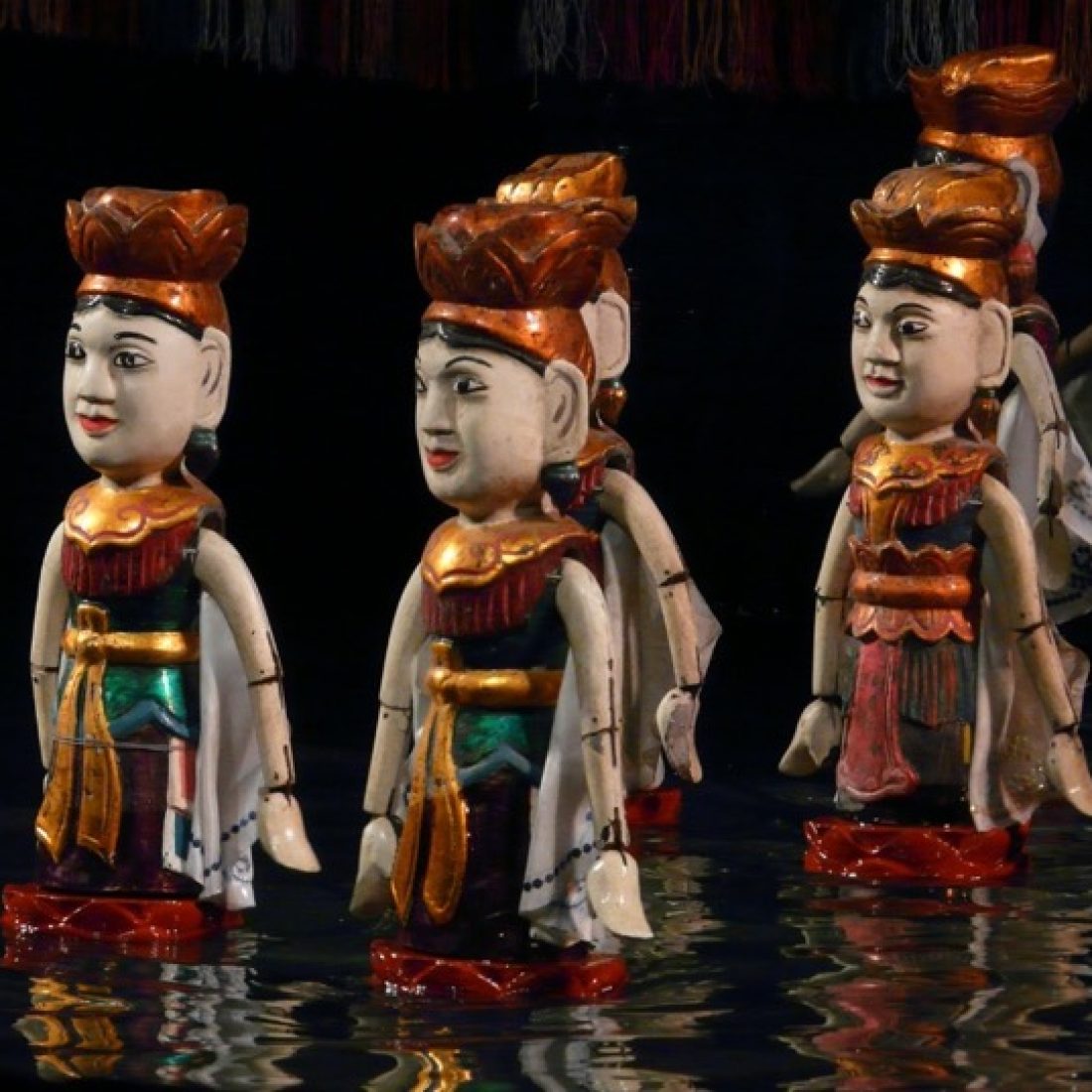 Traditional Thang Long water puppets performing on stage in Hanoi, Vietnam