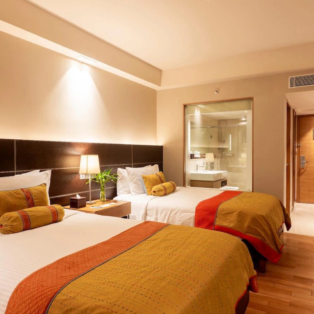 Twin room of a luxury 5-star hotel in New Delhi, perfect for high-end group travel stays.
